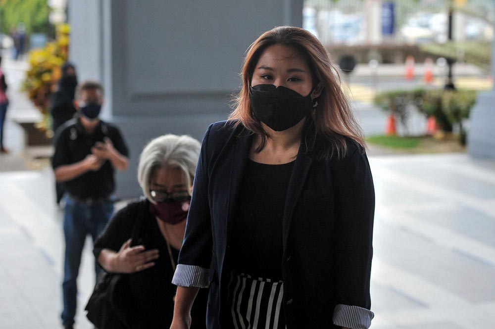 Refugee activist Heidy Quah charged in KL with internet misuse ...